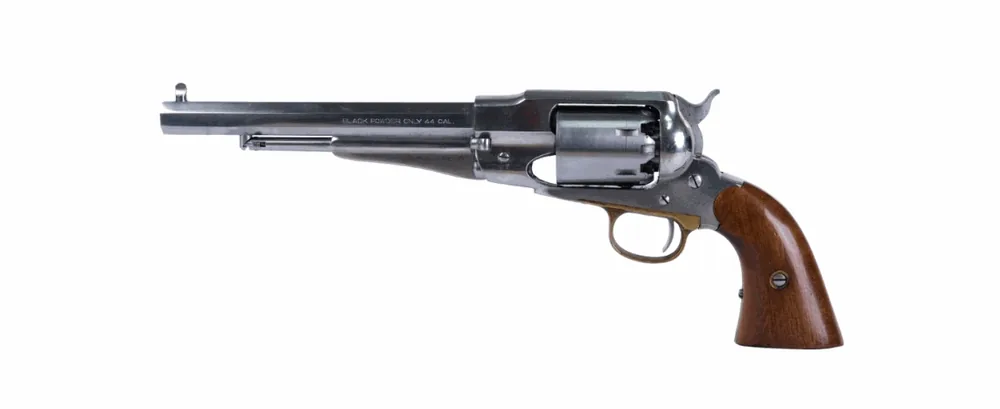 Historický revolver s ocelovým rámem, dlouhou osmihrannou hlavní a dřevěnými střenkami